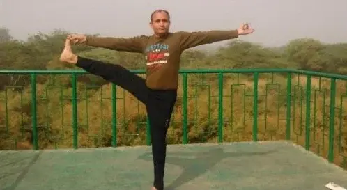 Standing hand-to-toe balance